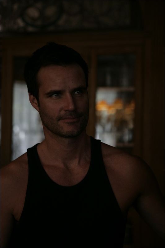 Ramey (Wade Russell) enters the house fresh from branding.